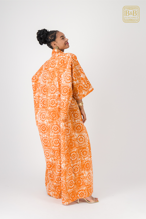 Robe africaine ankara orange motif floral fait main Sénégal - tenue femme cérémonie