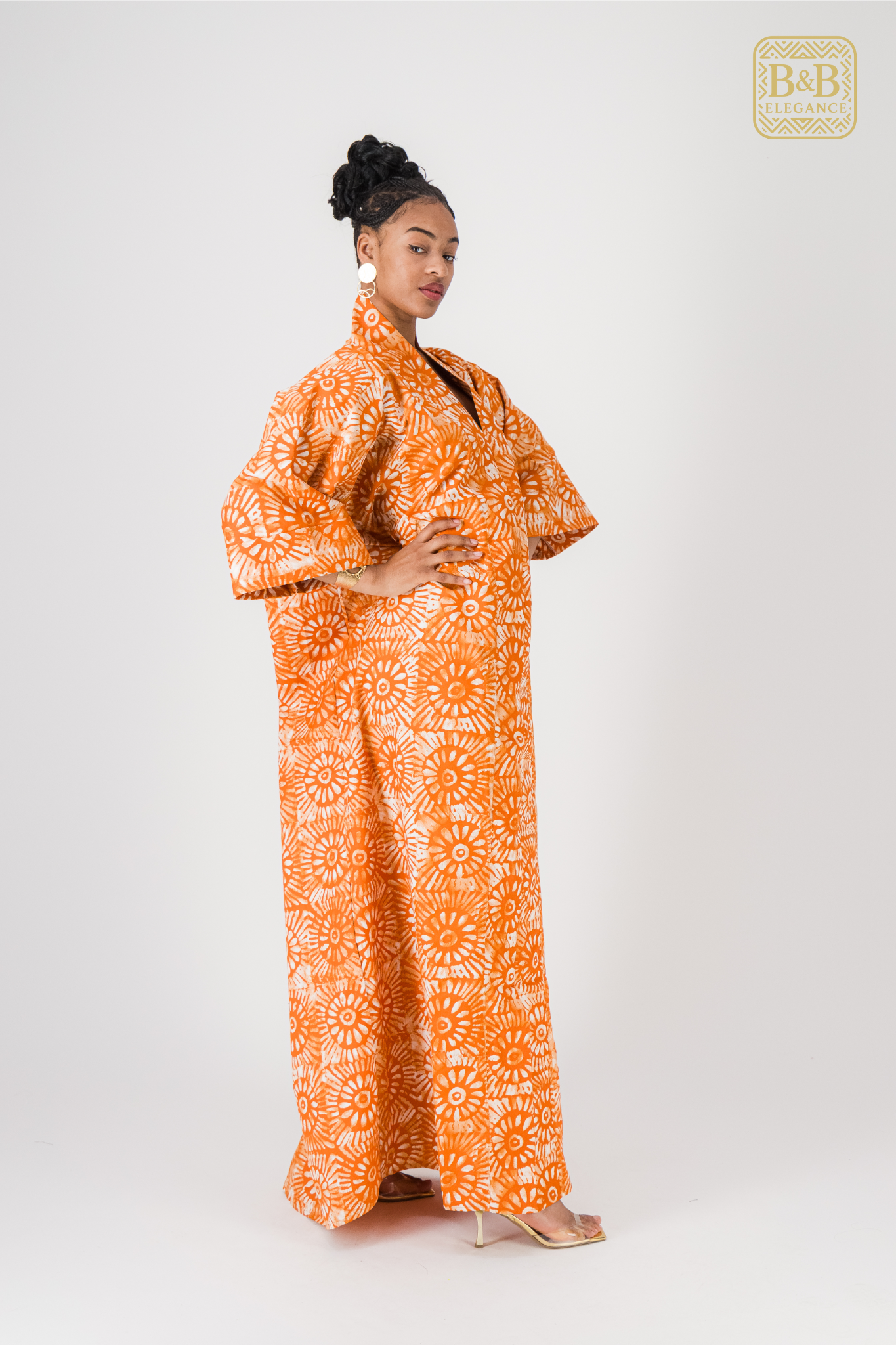 Robe africaine ankara orange motif floral fait main Sénégal - tenue femme cérémonie
